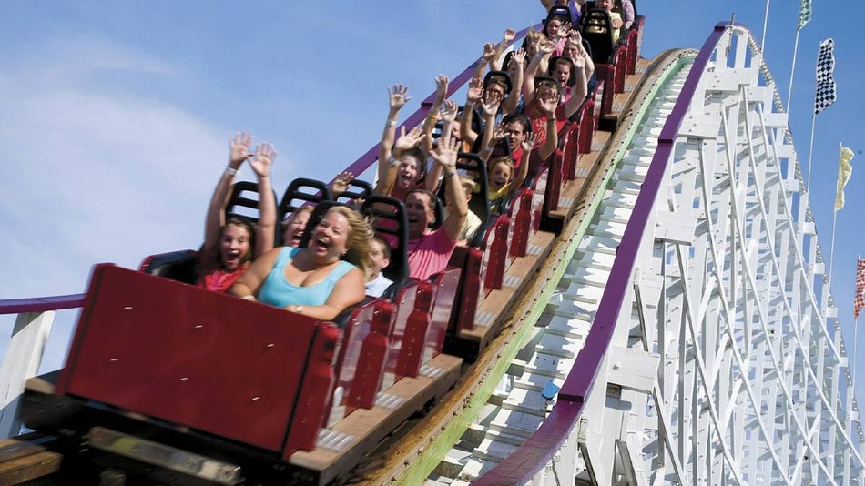People rinding a roller coaster at Family Kingdom in Myrtle Beach, South Carolina, USA