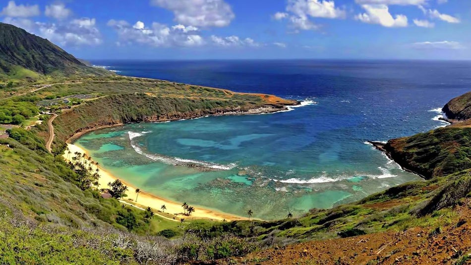 aerial view of beach and ocean on a sunny day in Hanauma Bay in Oʻahu, Hawaii, USA
