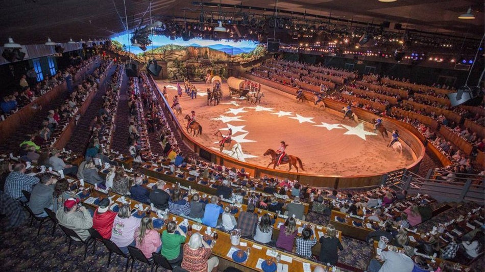performers on horseback at Dolly Parton's Stampede dinner attraction arena in Pigeon Forge, Tennessee, USA