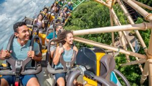 Guests on the Cheetah Hunt roller coaster at Busch Gardens in Tampa, Florida, USA