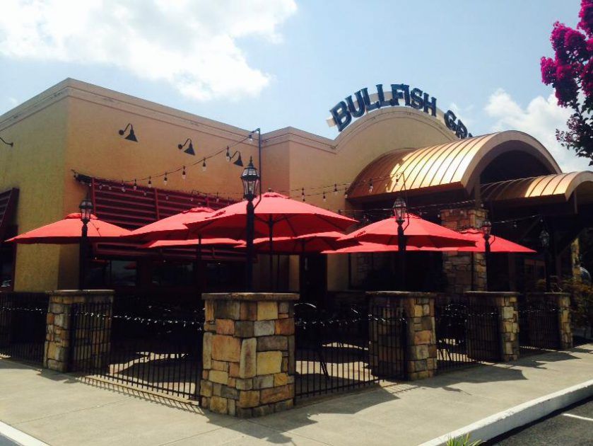 exterior view of Bullfish Grill during a sunny day in Pigeon Forge, Tennessee, USA