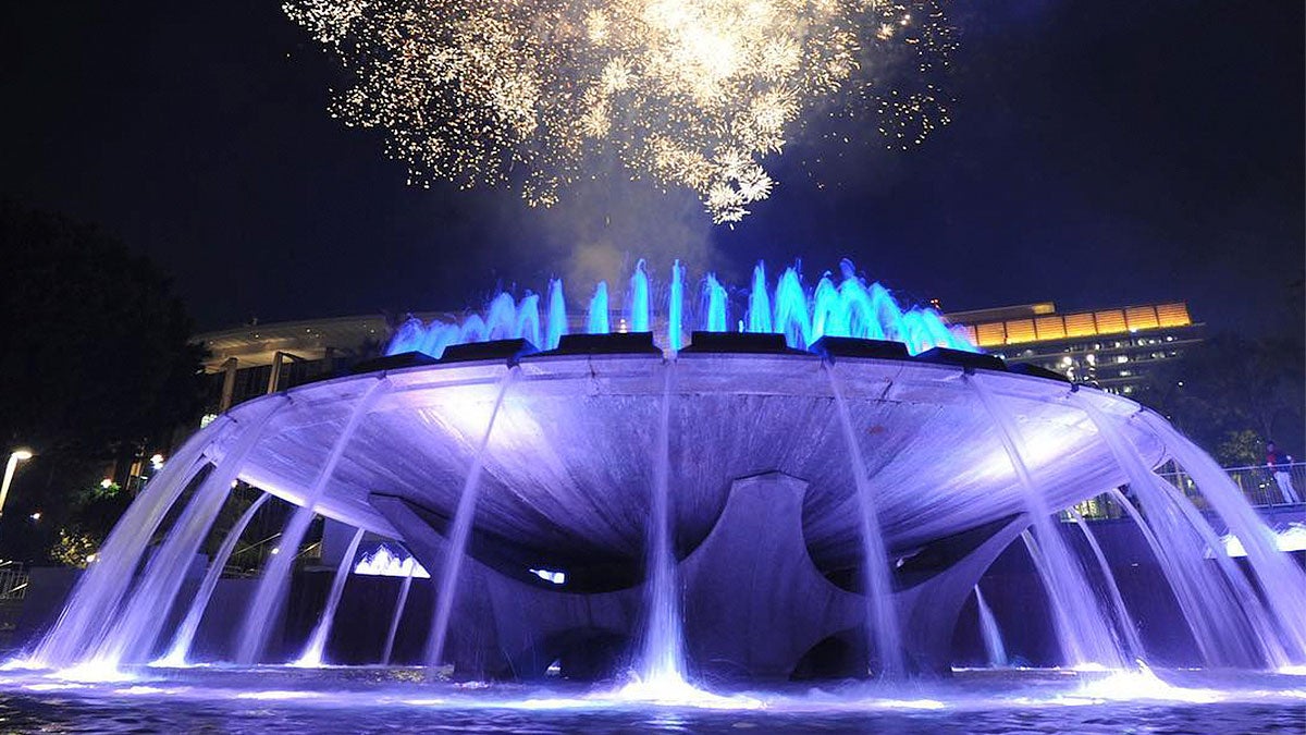 nighttime view of fountains with fireworks at Grand Park in Los Angeles, California, USA