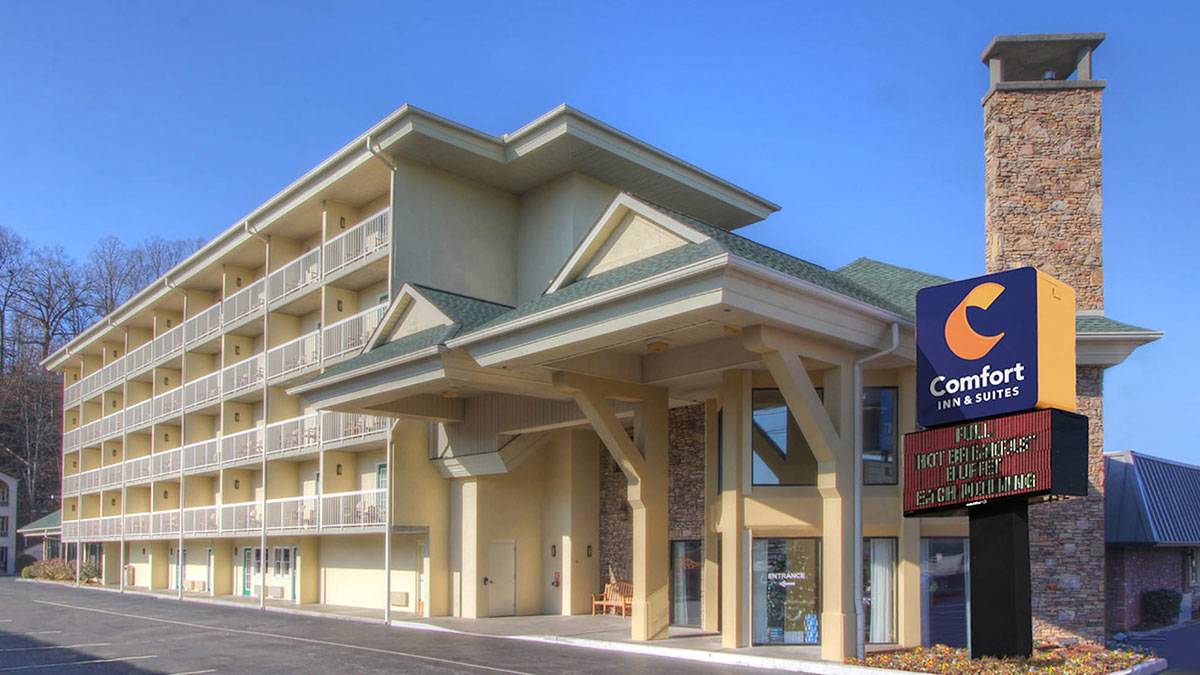 exterior view of sign and hotel at Comfort Inn & Suites At Dollywood Lane in Pigeon Forge, Tennessee, USA