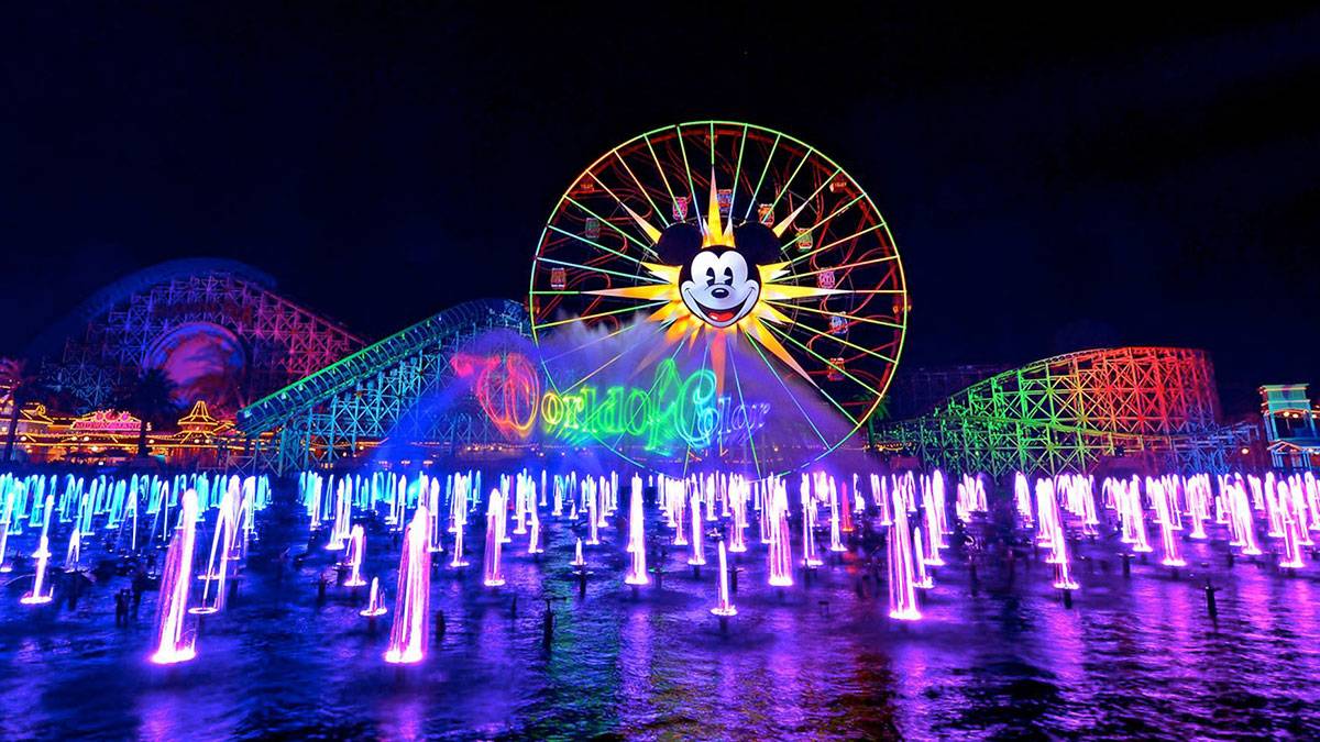 ground view of multi-colored lights and wheel at World of Color at Disneyland Resort in Los Angeles, California, USA