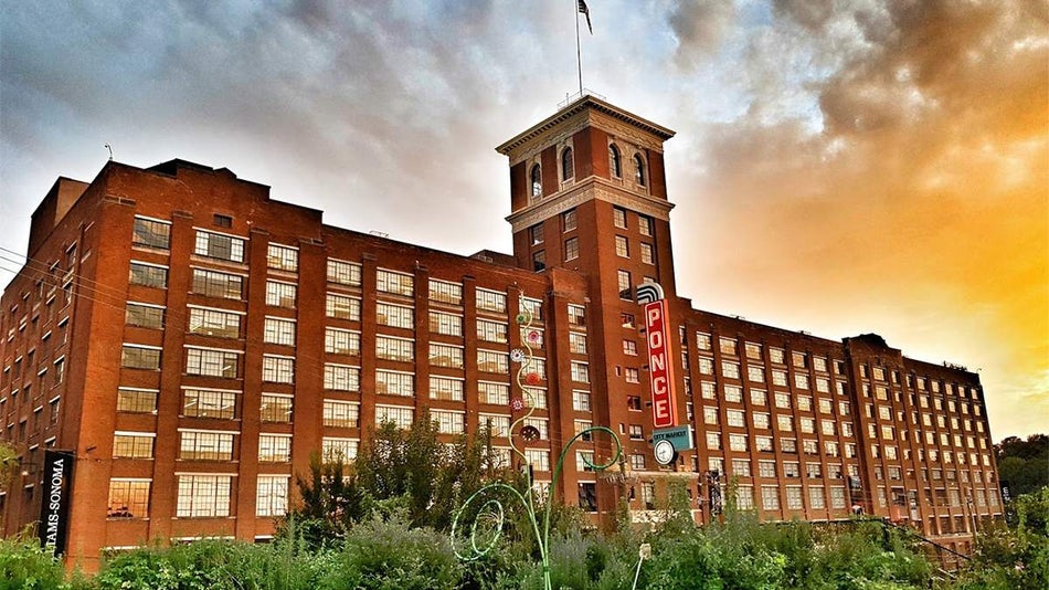 exterior view of Ponce City Market at sunset in Atlanta, Georgia, USA