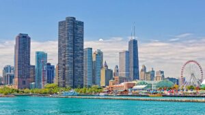 view of Chicago skyline from lake Michigan with Navy Pier in Chicago, Illinois, USA