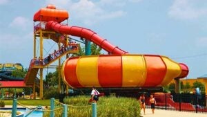 large yellow and orange water slide at Myrtle Waves Water Park in Myrtle Beach, South Carolina, USA