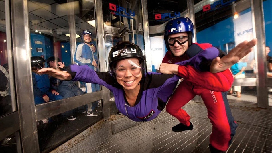 Woman and instructor at iFly Indoor Skydiving - Orlando, Florida, USA