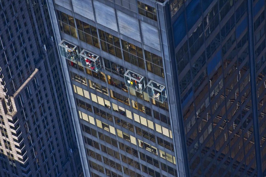 aerial exterior view of sky deck with people inside in Chicago, Illinois, USA