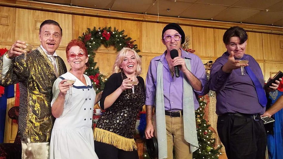 group of performers in costume at Sleuths Mystery Dinner Show in Orlando, Florida, USA