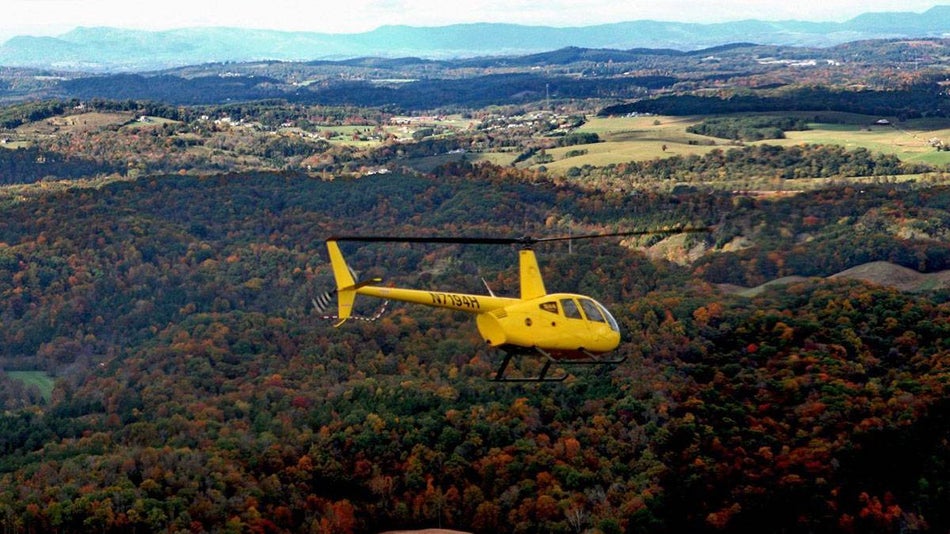 yellow helicopter giving tour over pigeon forge tennessee