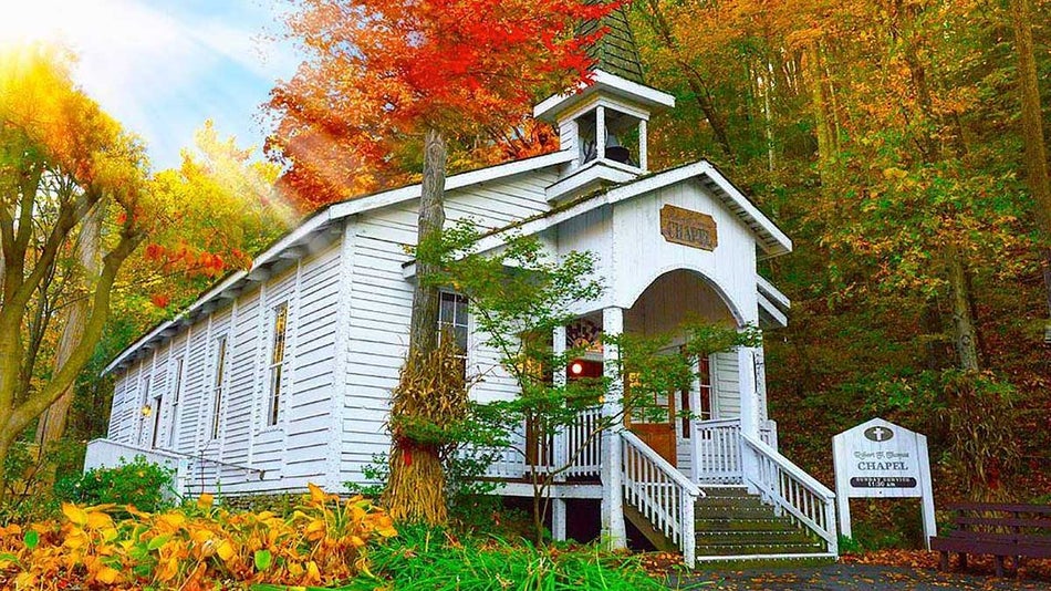 autumn view of the robert f thomas chapel at dollywood