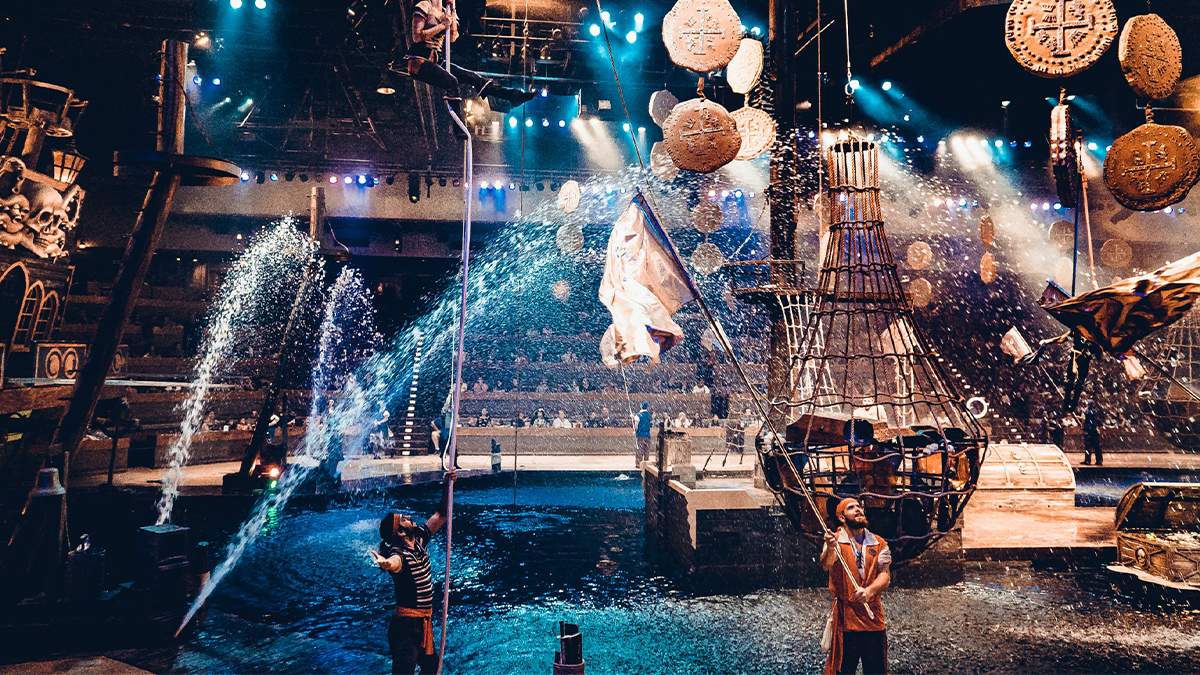 Performers shooting water at the Pirates Voyage Dinner & Show in Pigeon Forge, Tennessee, USA