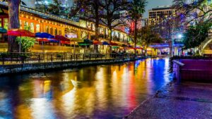 Night Time Scenic Views of the Riverwalk with Christmas Lights on a Rainy Day at San Antonio, Texas, USA