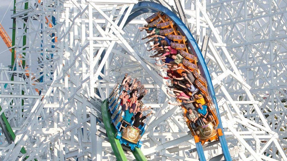 people on Twisted Colossus Roller Coaster at Six Flags Magic Mountain