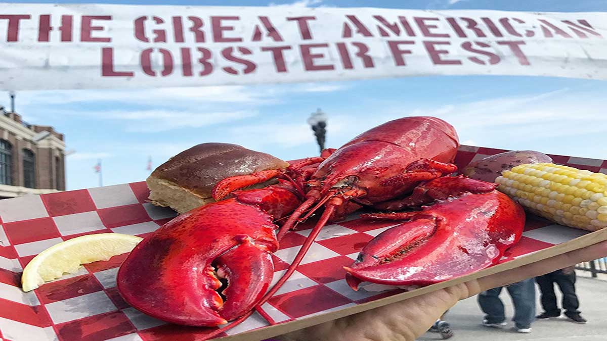 Great American Lobster Fest with lobster and corn on a plate