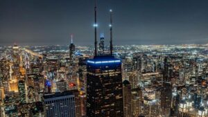 Wide shot of the top of the 360 Chicago Observation Deck at night in Chicago, Illinois