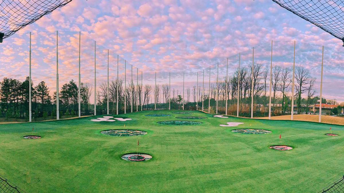 Photo over looking the course at Top Golf at sunset in Atlanta, Georgia, USA