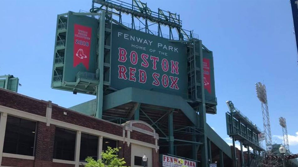 Shot from the ground of the Fenway Park sign on a sunny day in Boston, Massachusetts