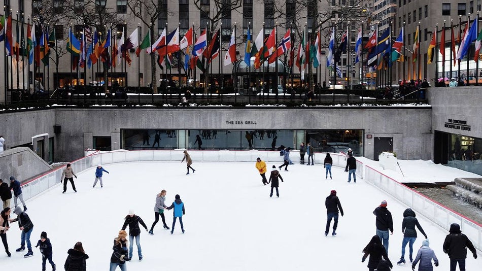 Shot looking down at people skating at the rink at Rockefeller Center in NYC, New York