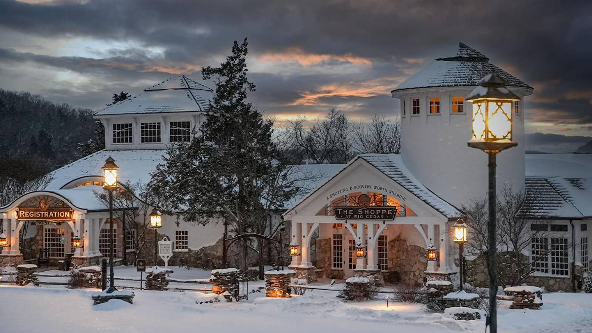 Wide shot of the Big Cedar Lodge with lots of snow at dusk in Branson, Missouri, USA