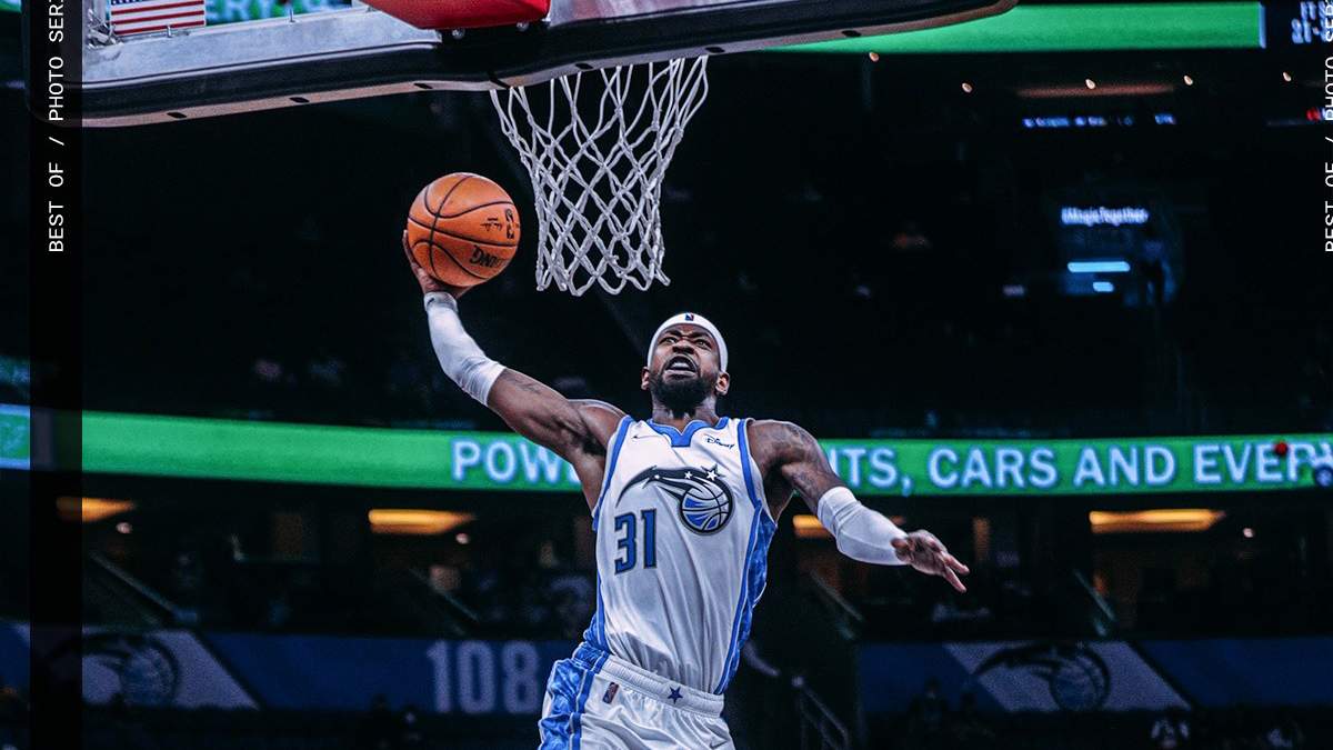 Close up photo of an Orlando Magic player dunking the ball in Orlando, Florida, USA