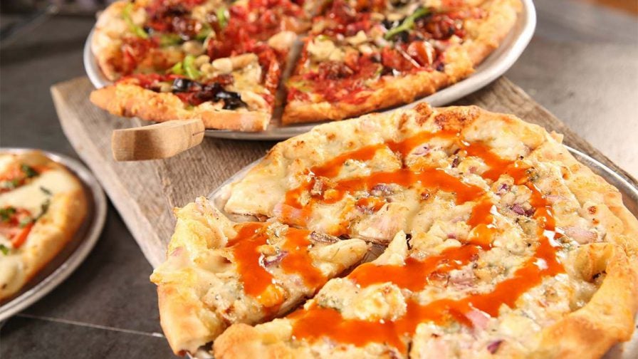 Close up photo of different pizzas from Smoky Mountain Brewery in Gatlinburg, Tennessee, USA