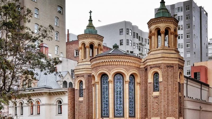 View of the top of the Eglise Notre Dame Des Victoires Catholic Church in the French Quarter of San Francisco, California, USA
