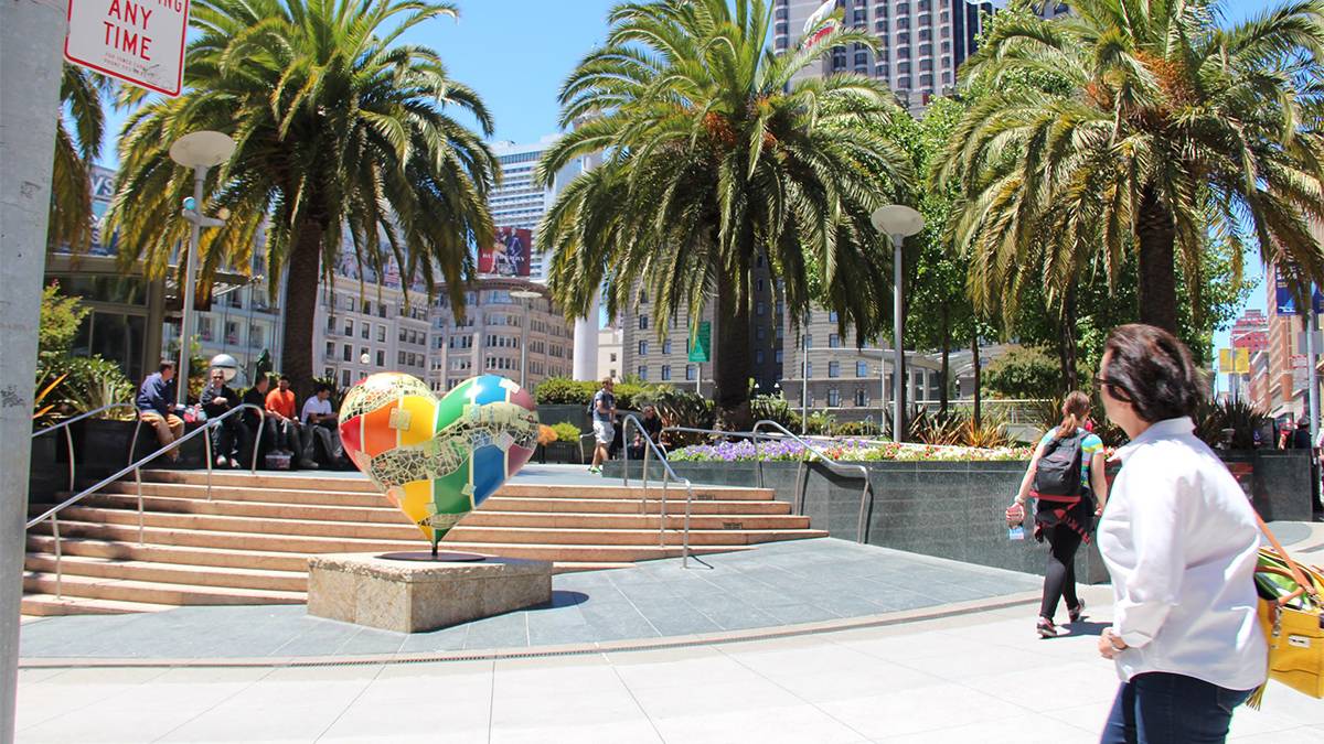 Ground view of a heart statue and trees on a sunny day in Union Square in San Francisco, California, USA