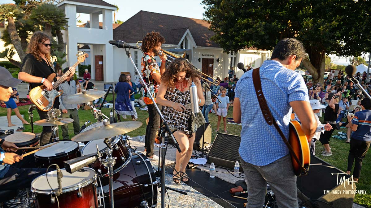 band performing infront of crowd at Carlsbad Music Festival during daytime in Carlsbad, California, USA