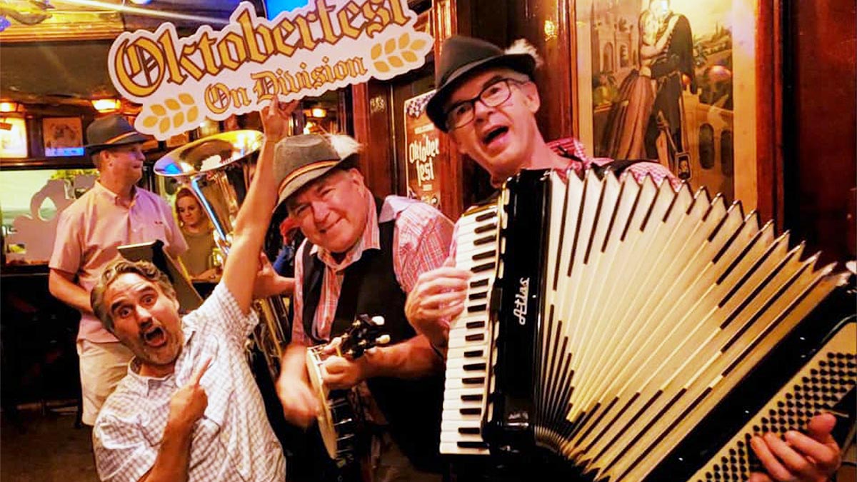 A group of people enjoy playing different of a musical instrument.