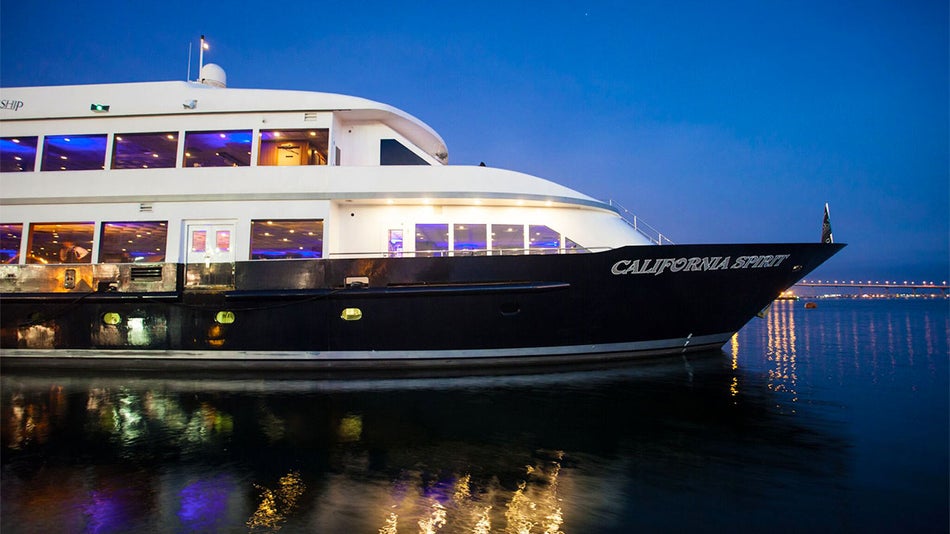 close up of San Diego Dining Cruise by Flagship on water at night in San Diego, California, USA