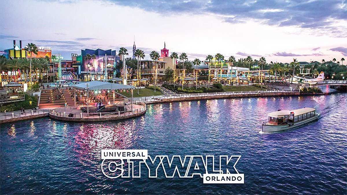 aerial of Universal CityWalk with boat on water on cloudy day in Orlando, Florida, USA