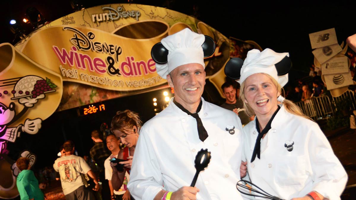 A couple wearing chef's attire