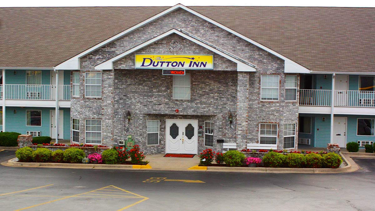 exterior of Dutton Inn with large sign above entrance in Branson, Missouri, USA