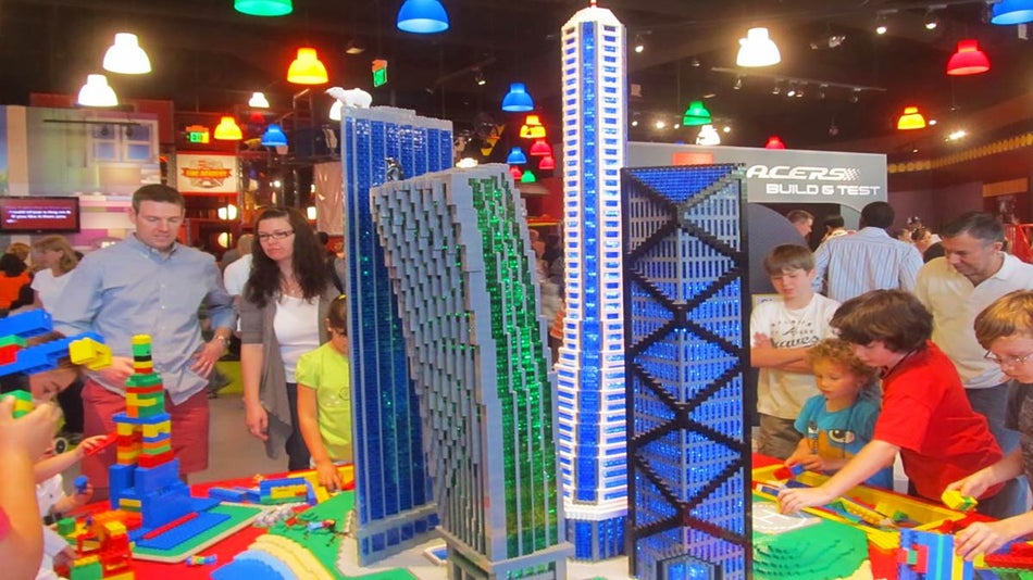 crowd gathered around Earthquake Table at Legoland in Atlanta, Georgia, USA