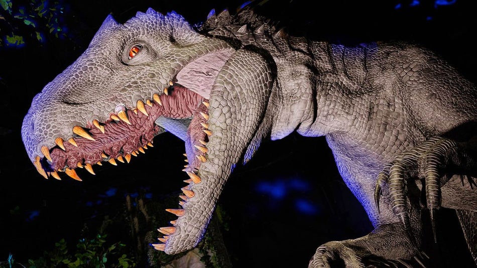 close up of dinosaur at Indominus Rex ride at Universal Studios Hollywood in Los Angeles, California, USA