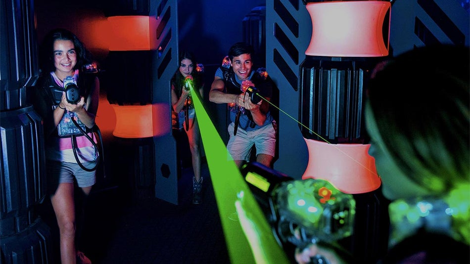 friends playing laser tag at Laser Tag Theater at Boomers Livermore in San Francisco, California, USA