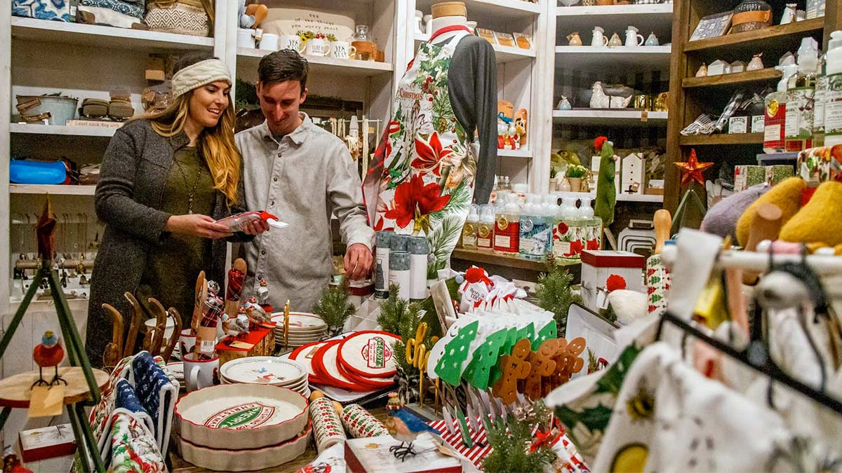 couple checking various Christmas items
