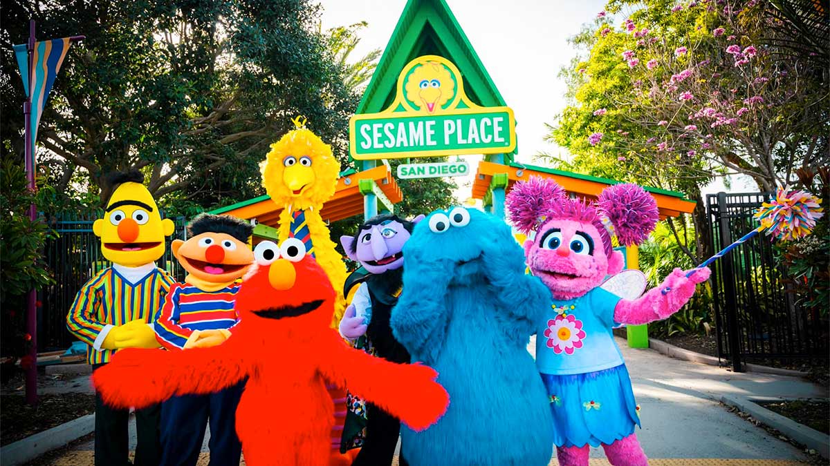 A collection of photographs of Elmo and his friends from Sesame Place