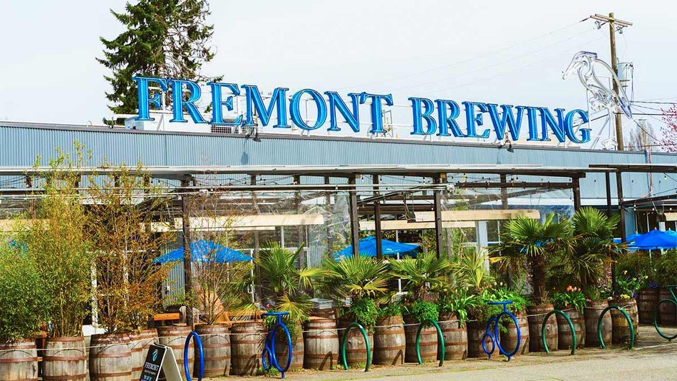 exterior of Fremont Brewing with plants surrounding building in Seattle, Washington, USA
