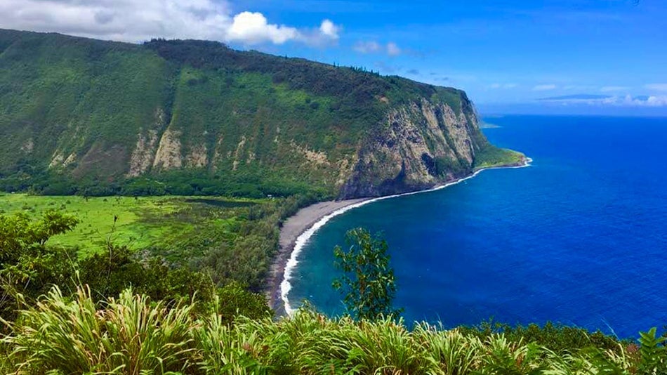 a stunning, expansive ocean and a mountain