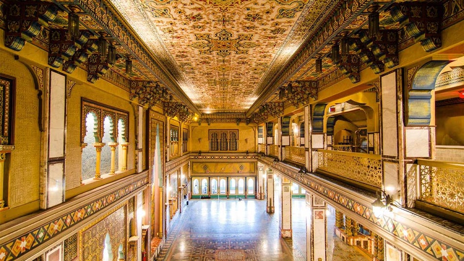 A wide photograph of a open house theater