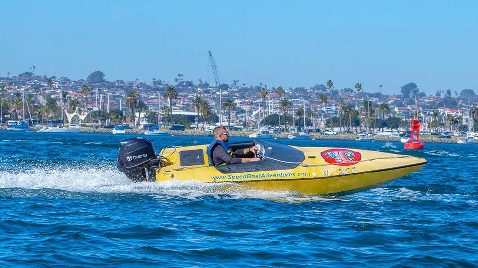 man on yellow speed boat on water during day for San Diego Speed Boat Adventures in San Diego, California, USA