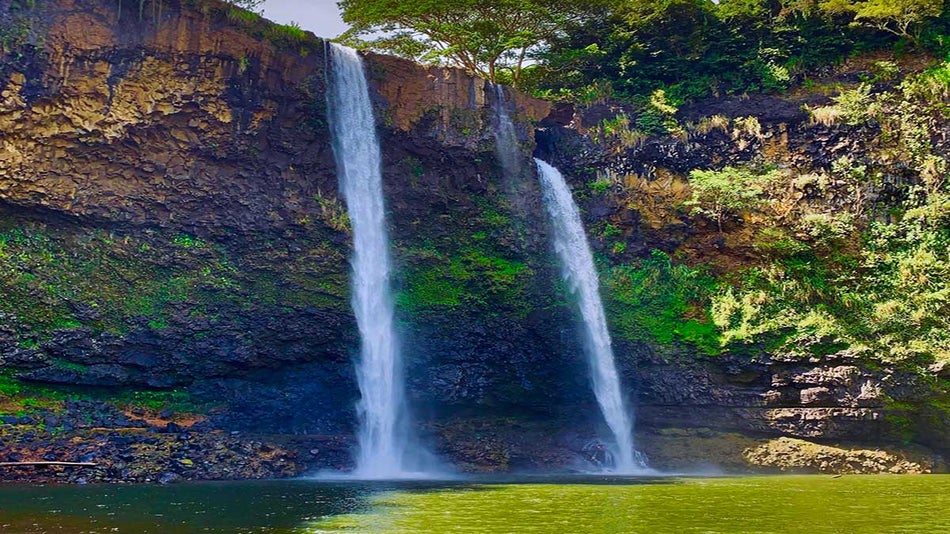 close up of Secret Falls at Wailua River on sunny day in Kauai, Hawaii, USA