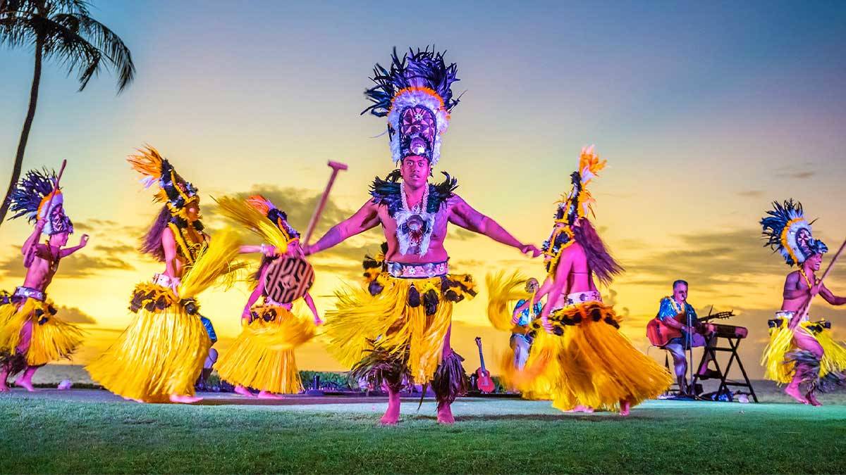 A group of dancers performs at a feast in Hawaii. 