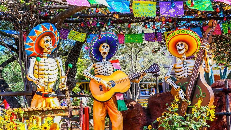 Dia de los Muertos display with skeleton figures playing instruments at Disneyland in Los Angeles, California, USA