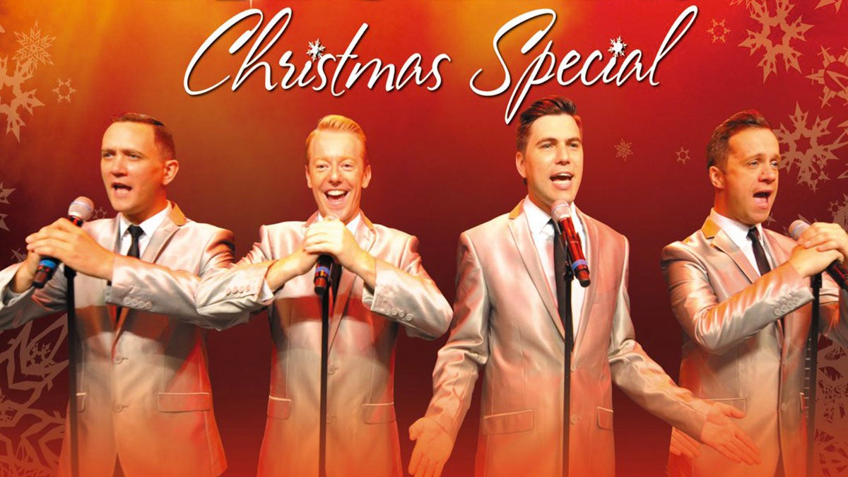 banner for Hot Jersey Nights Christmas Show featuring singers in silver suits in Myrtle Beach, South Carolina, USA