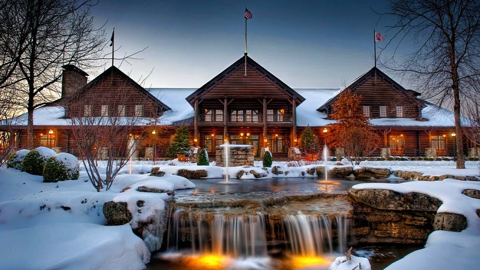 exterior of Keeter Center with waterfall in foreground during winter in Branson, Missouri, USA