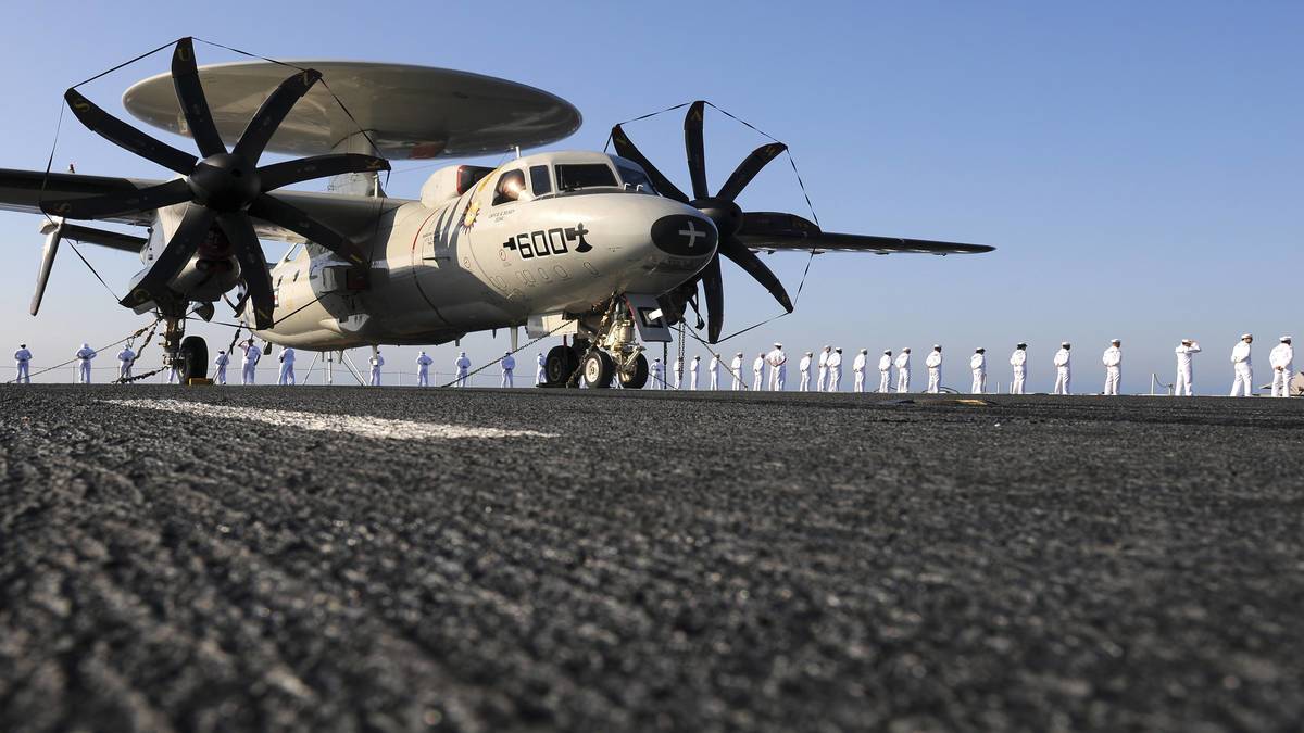 E-2C Hawkeye sits on the flight deck of USS Abraham Lincoln